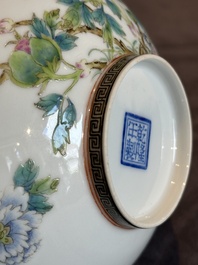A Chinese famille rose eggshell 'peonies' bowl, Qianlong mark, 20th C.