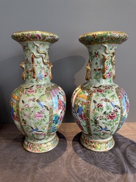 A pair of Chinese Canton famille rose celadon-ground 'court scene' vases, 19th C.