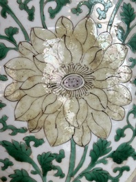 A Chinese famille verte jar with floral design and a wooden cover, Kangxi