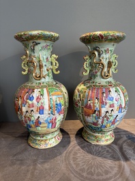 A pair of Chinese Canton famille rose celadon-ground 'court scene' vases, 19th C.