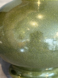 A Chinese monochrome teadust-glazed bottle vase, Qianlong mark and of the period