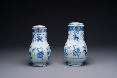 Two Chinese blue and white jugs and cover with floral design, Yongzheng/Qianlong