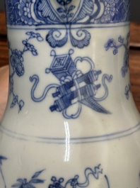 Two Chinese blue and white jugs and cover with floral design, Yongzheng/Qianlong