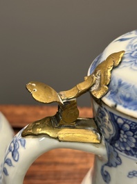 Two Chinese blue and white jugs and cover with floral design, Yongzheng/Qianlong