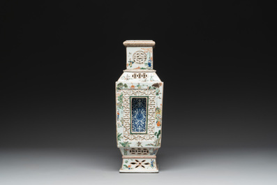 An extremely rare Chinese blue, white and famille verte openworked double-walled vase with figural design, 19th C.