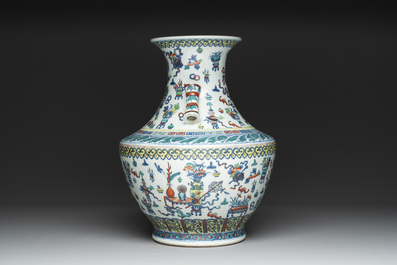 A Chinese doucai 'antiquities' 'hu' vase, Qianlong mark, 19th C.