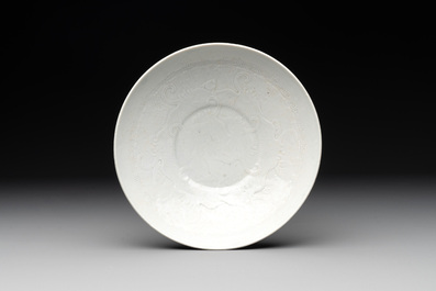 A Chinese incised white-glazed bowl and a pair of turquoise-glazed vases, Ming