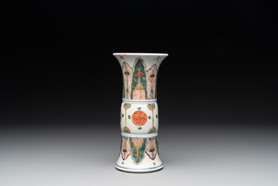 A Chinese famille verte 'gu' vase with stylised floral design, Kangxi