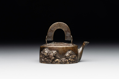 A Japanese bronze 'shishi lions' water dropper, Meiji, 19th C.