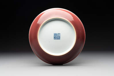 A Chinese copper-red-glazed plate, Qianlong mark and of the period