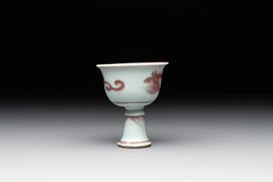 A Chinese copper-red and white 'chilong' stem cup, Ming