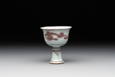 A Chinese copper-red and white 'chilong' stem cup, Ming