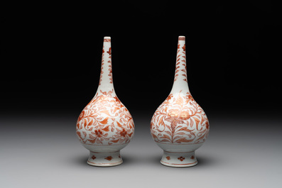 A pair of Chinese iron-red and gilt-decorated rose water sprinklers, Kangxi