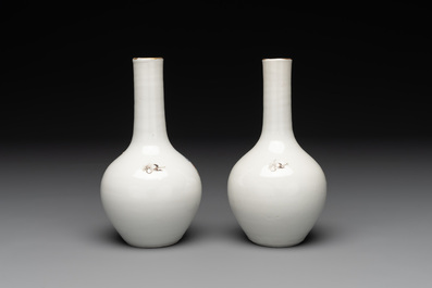A pair of Chinese famille rose 'Lan Caihe' bottle vases, 19th C.