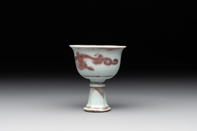 A Chinese copper-red and white 'chilong' stem cup, Ming