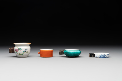 A collection of nine Chinese blue and white, monochrome and famille rose bird feeders, 19th C.