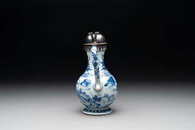 A Chinese silver-mounted blue and white 'Mongolian hunt' ewer, Transitional period