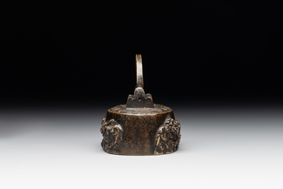A Japanese bronze 'shishi lions' water dropper, Meiji, 19th C.