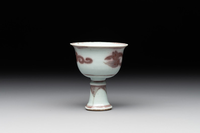 A Chinese copper-red and white 'chilong' stem cup, Ming