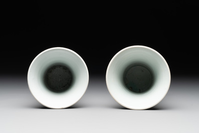 A pair of Chinese blue and white beaker vases with floral sprigs, Transitional period