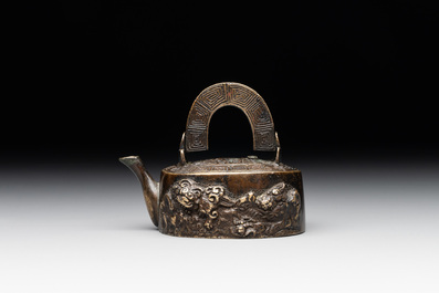 A Japanese bronze 'shishi lions' water dropper, Meiji, 19th C.