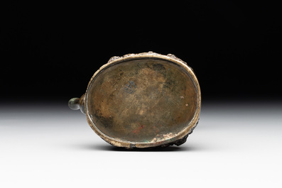 A Japanese bronze 'shishi lions' water dropper, Meiji, 19th C.