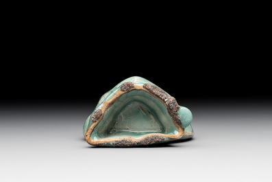 A Chinese Longquan celadon lobed bottle vase, Song