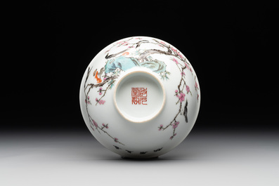 A Chinese famille rose bowl with birds amongst branches, 20th C.