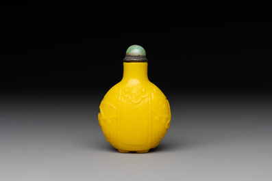 A Chinese yellow Peking glass 'elephant' snuff bottle, Xing You Heng Tang 行有恆堂 mark, 19th C.