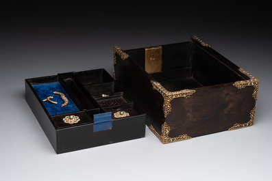 A colonial hardwood writing box with enamelled gold mounts, 18th C.