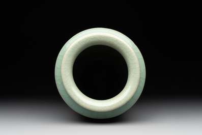 A Chinese Longquan celadon cylindrical vase with incised floral design, Ming