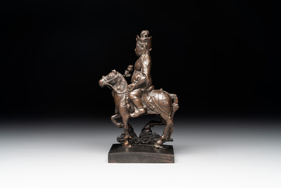 A rare Chinese bronze Vaishravana on horseback with wooden stand, Yuan