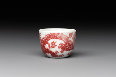 A small Chinese blue, white and copper-red 'dragon' wine cup, Lang Jin Ge Zhi 郎唫閣製 mark, 19/20th C.