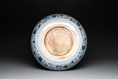 A large Chinese blue, white and copper-red 'carp' dish, 19/20th C.