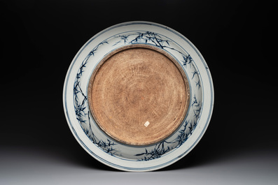 A massive Chinese blue and white 'landscape' dish, 19th C.