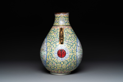 A Chinese Canton enamel '100 boys' 'hu' vase, 20th C.