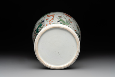 A fine Chinese famille verte 'mythical creatures' vase on a reticulated wooden stand, Kangxi