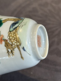 A pair of Chinese famille rose 'monkey and deer' cups and saucers, Tongzhi mark and of the period