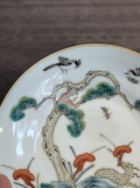 A pair of Chinese famille rose 'monkey and deer' cups and saucers, Tongzhi mark and of the period