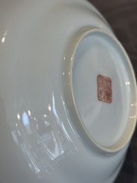 A pair of Chinese famille rose 'monkey and deer' cups and saucers, Tongzhi mark and of the period
