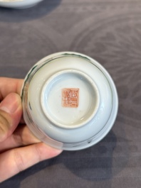 A pair of Chinese famille rose 'monkey and deer' cups and saucers, Tongzhi mark and of the period