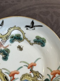 A pair of Chinese famille rose 'monkey and deer' cups and saucers, Tongzhi mark and of the period