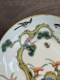 A pair of Chinese famille rose 'monkey and deer' cups and saucers, Tongzhi mark and of the period