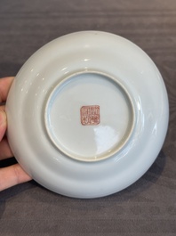 A pair of Chinese famille rose 'monkey and deer' cups and saucers, Tongzhi mark and of the period