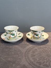 A pair of Chinese famille rose 'monkey and deer' cups and saucers, Tongzhi mark and of the period
