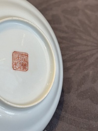 A pair of Chinese famille rose 'monkey and deer' cups and saucers, Tongzhi mark and of the period