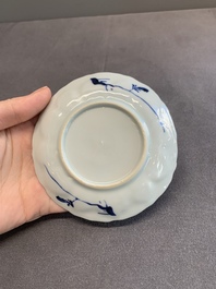 Twelve Chinese blue and white saucers and eight cups, Kangxi/Yongzheng