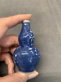 Three Chinese powder blue-ground blue and white snuff bottles and one blue and white snuff bottle, 19th C.