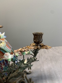 A pair of candle holders mounted with Chinese famille rose models of pheasants, Qianlong
