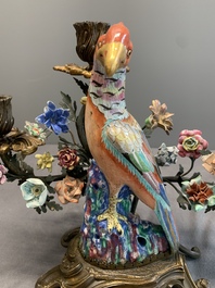 A pair of candle holders mounted with Chinese famille rose models of pheasants, Qianlong